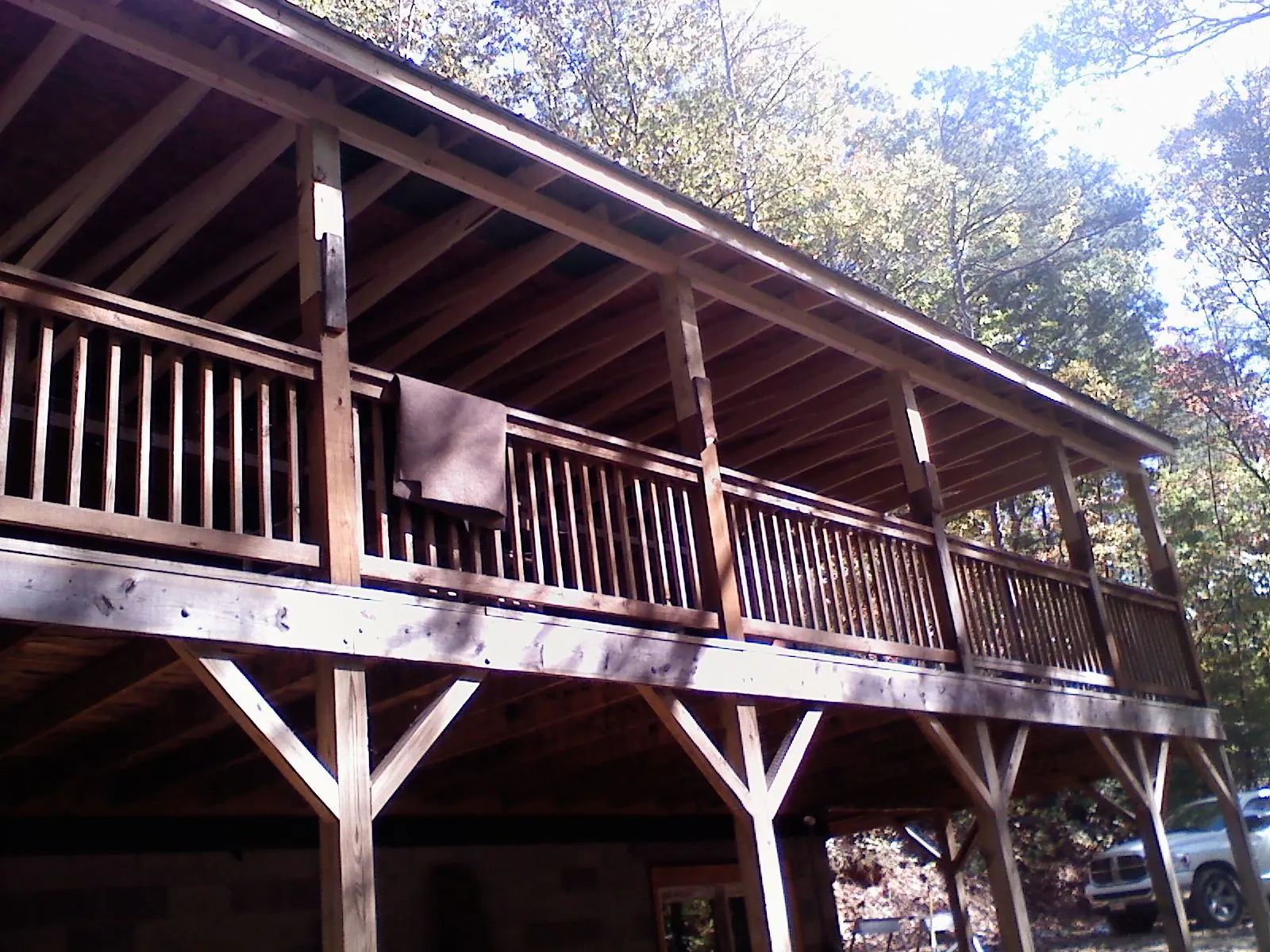 Timber framing under a new elevated porch and deck — Roof Leak Repair in Pottersville by Roofing Brothers